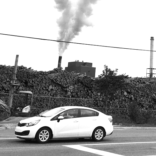 Car and factory smoke